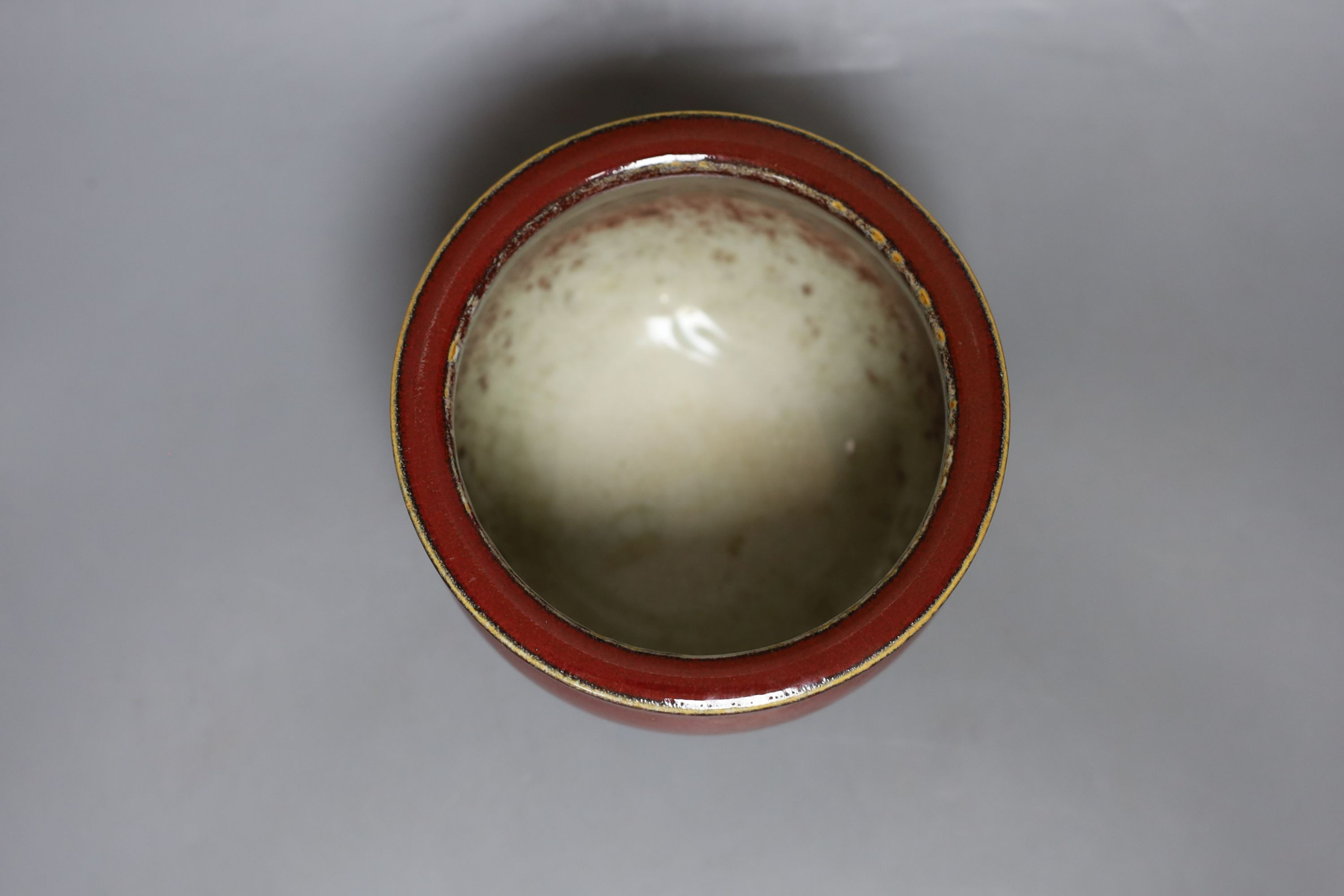 A Chinese sang de boeuf glazed jardiniere - 11cm tall